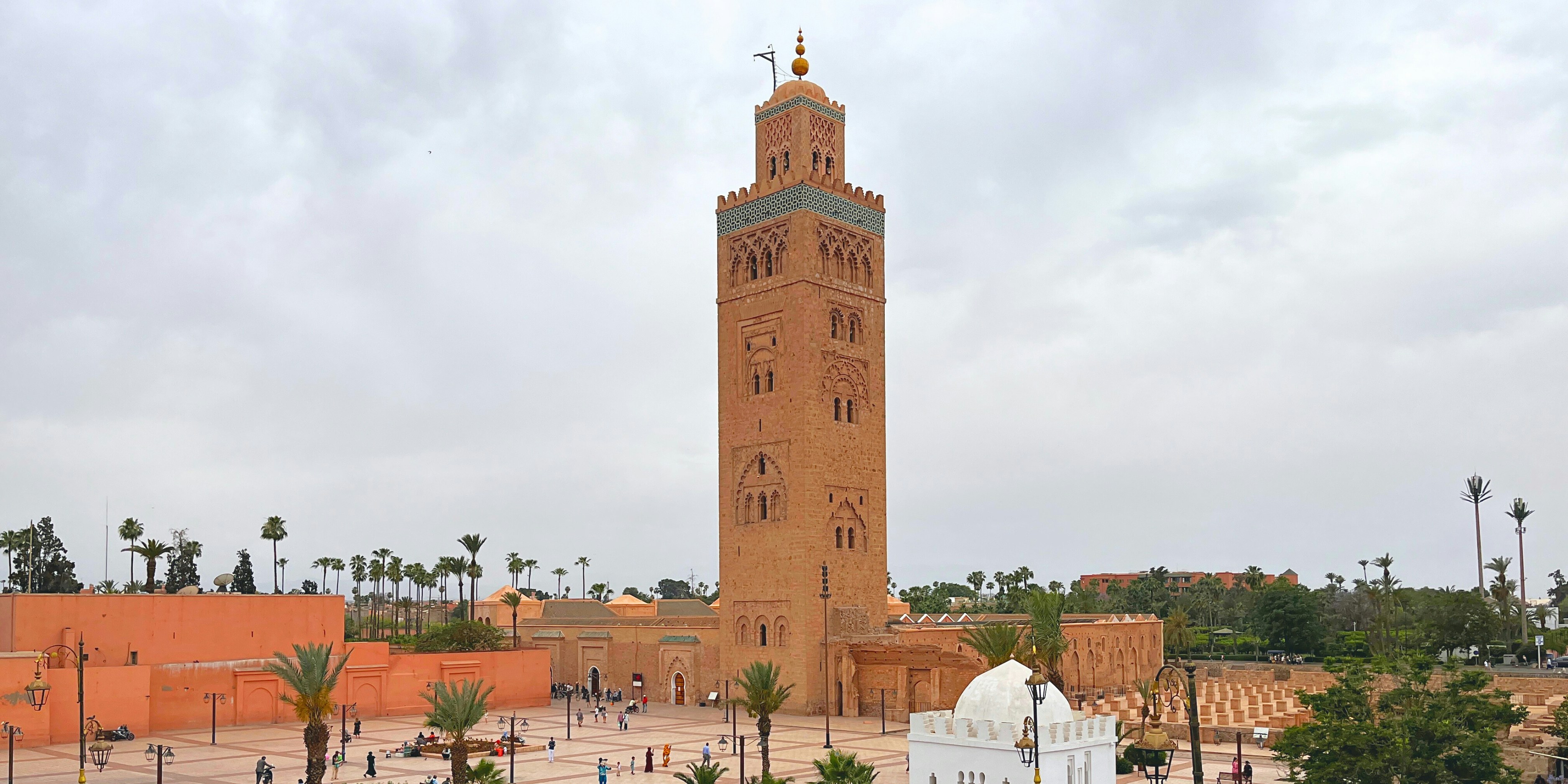 Koutoubia Mosque minaret at sunset in Marrakech Morocco medina with terracotta rooftops