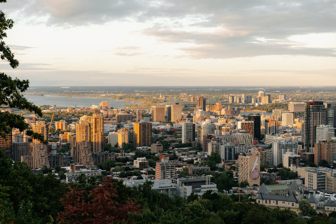 Breathtaking aerial view of Montreal at sunset showing the skyline and St. Lawrence River