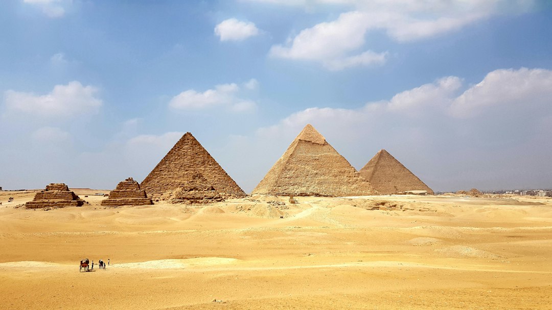 The Giza pyramids in the desert, the centerpiece of how much is a trip to Egypt from USA travelers budget for
