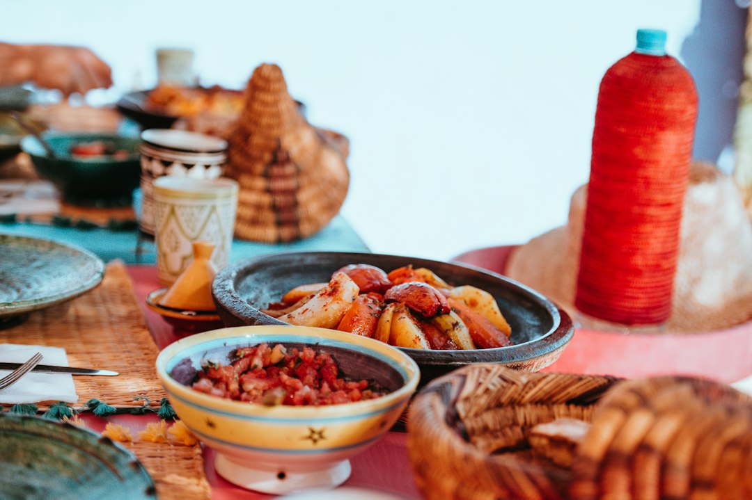 Moroccan tagine served at a table, a staple of food in Marrakech