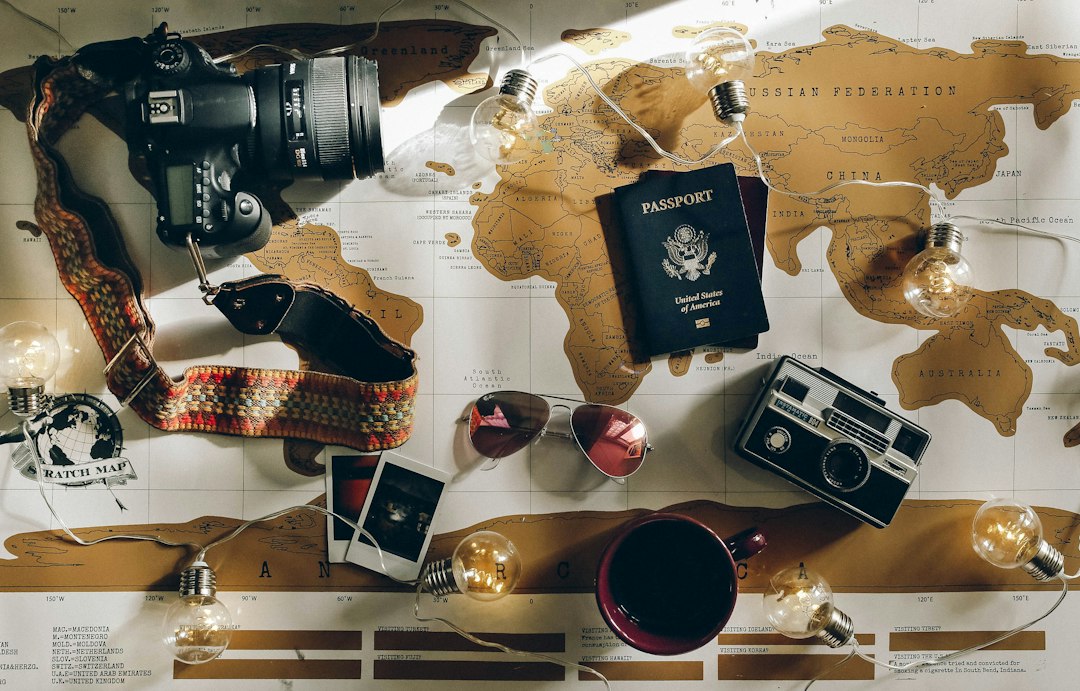 Travel planning flat lay with a map, passport and notebook for a North Africa trip