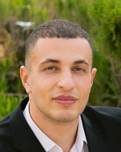 Co owner of Th Next Stamp posing for travel photo